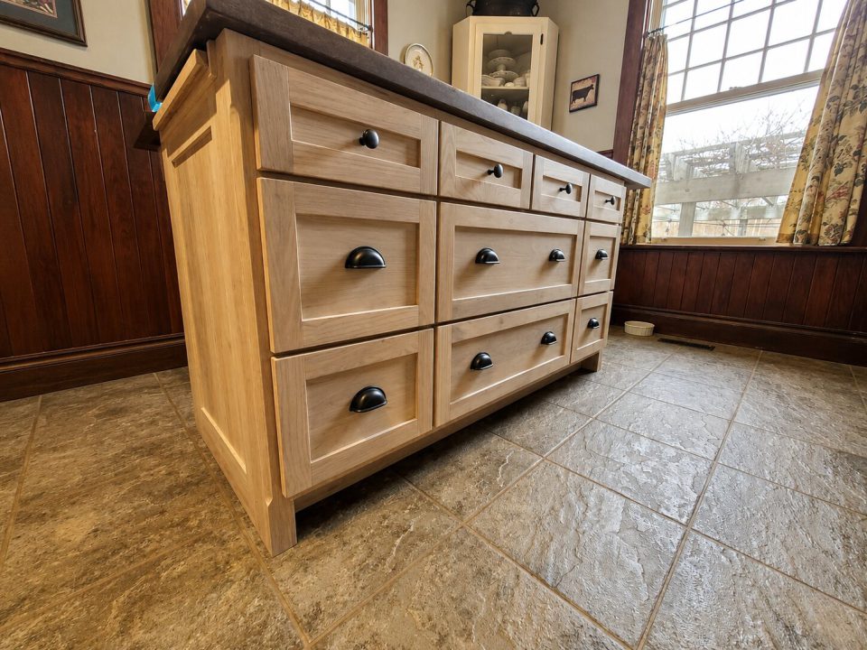 Ash and walnut kitchen island with drawer bank