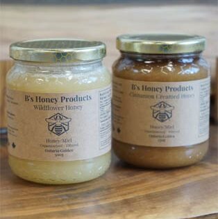 Jars of B's Honey Products wildflower honey and cinnamon creamed honey