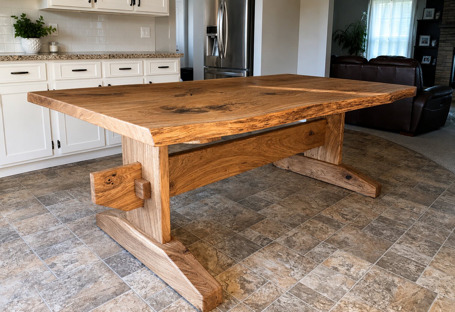 Live edge white oak trestle table with pinned through tenon joinery