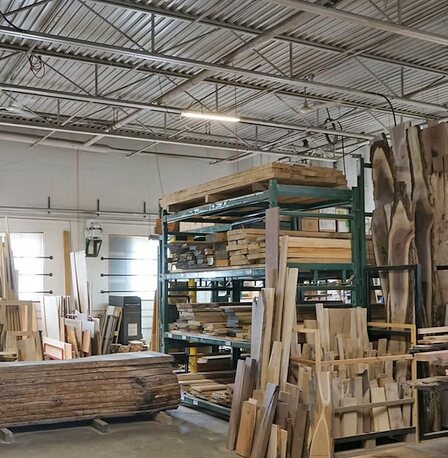 Kiln dried Ontario hardwood lumber and live edge slabs in the warehouse