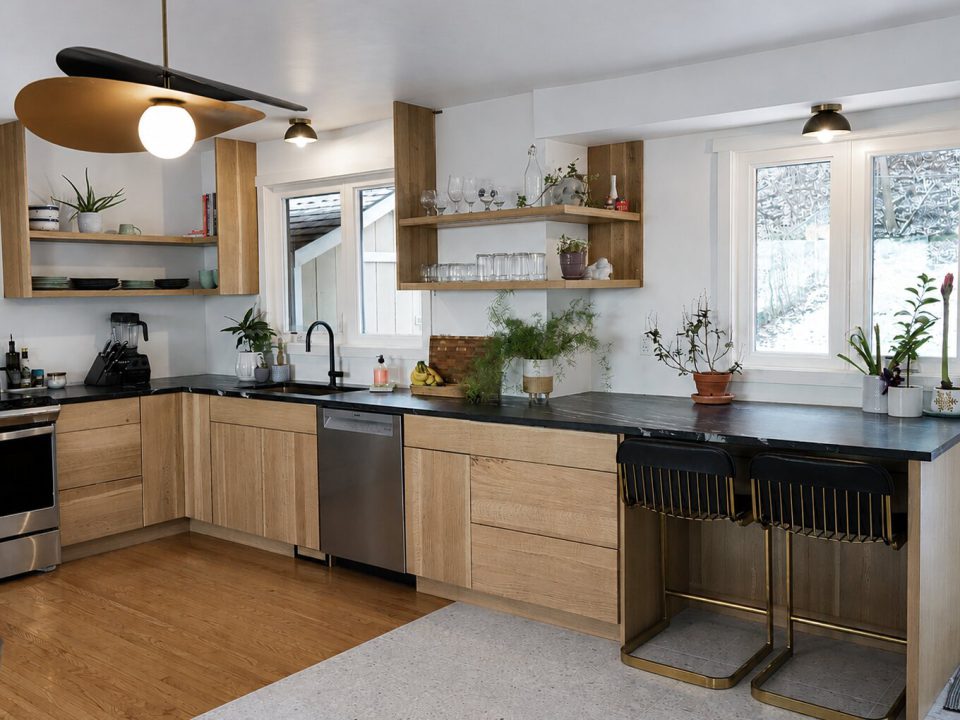 Quarter sawn oak slab door kitchen with open upper shelves